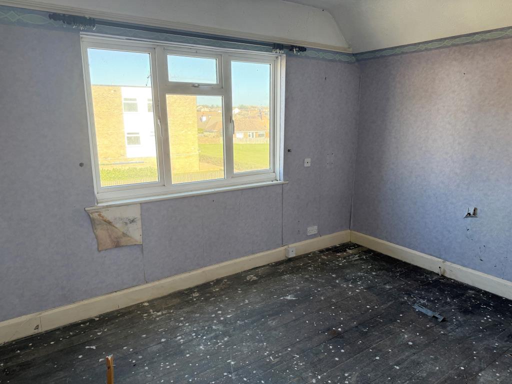Lot: 180 - DETACHED MIXED USE PROPERTY AND LAND WITH POTENTIAL (STNC) - Main bedroom with window overlooking South Coast Road